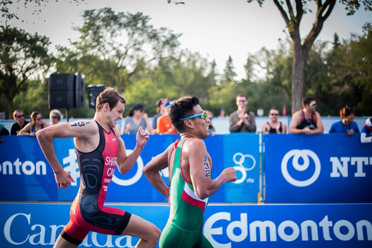 market opportunity analysis - two triathletes racing to the finish
