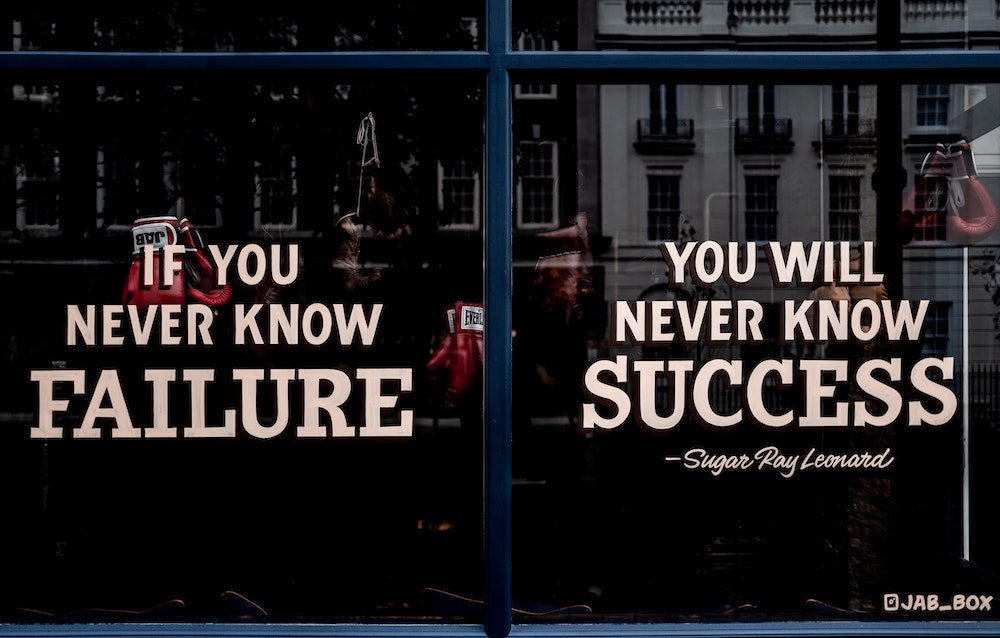Shop window with the Sugar Ray Leonard quote 'If you never know failure you will never know success'