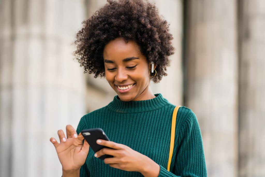A woman doing a survey on her phone