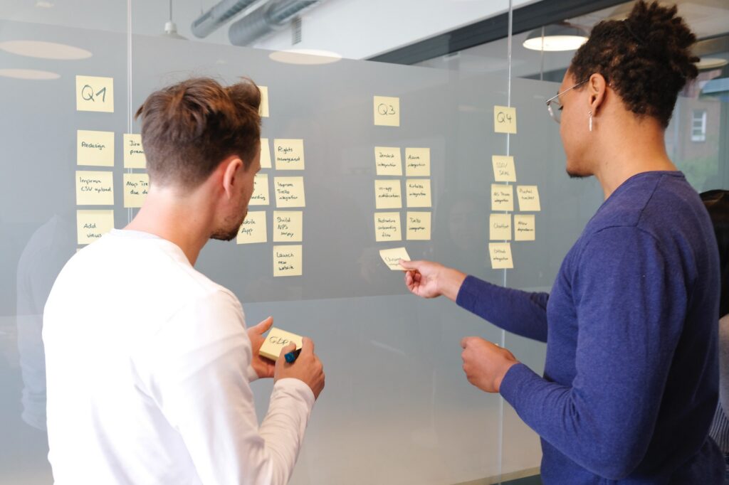 Two people brainstorming for new product development