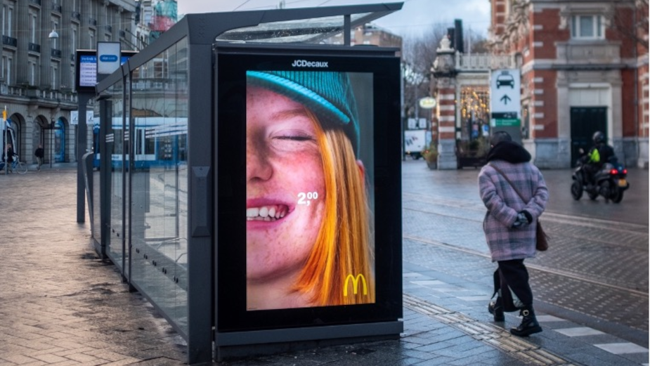 Mcdonalds ad at a bus stop to illustrate the concept of ad testing