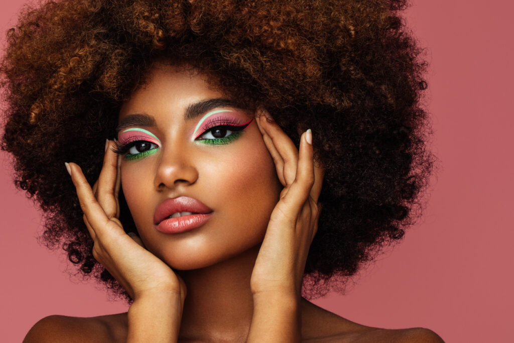Portrait of young woman with bright make-up