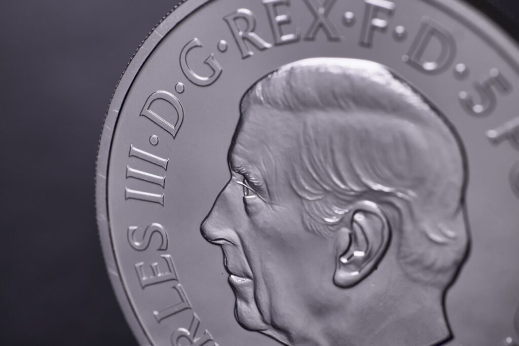 Image of a coin with prince charles on it