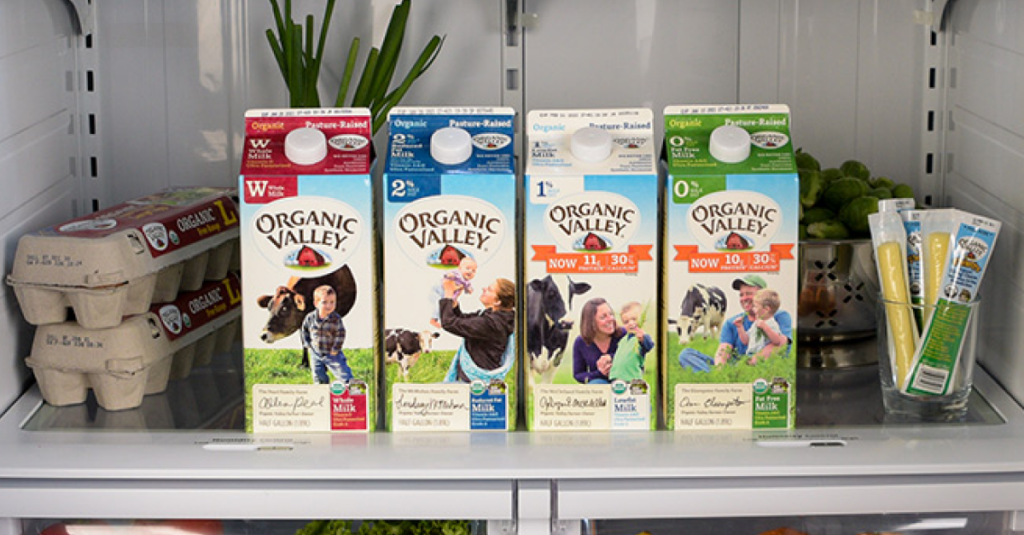fridge containing four cartons of organic valley milk