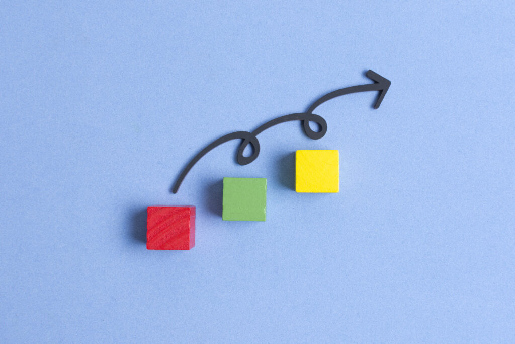 Colorful blocks and an upward arrow representing a more scalable research workflow.
