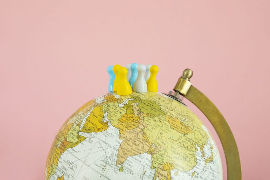 World globe with markers highlighting multiple international markets for consumer research.